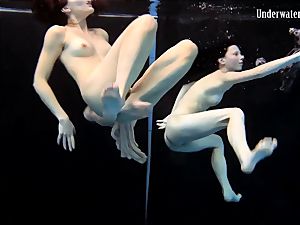 two dolls swim and get bare cool